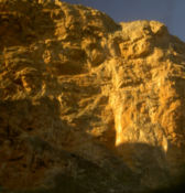 The sun strikes some rocks