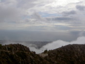 Looking down to the town, covered in cloud