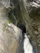 Water shoots out of the rocks...