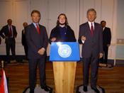 Addressing the nation with Blair and Bush