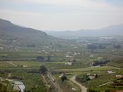 The road into Alora and a river