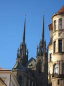 The two towers of the cathedral rise up over other buildings